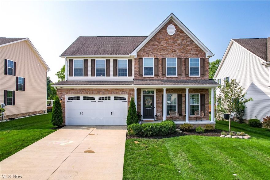 Welcome to the Villas of Bertram in the beautiful City of Aurora! Step into this stunning modern home, expertly designed like an HGTV masterpiece! Open concept Chantilly Place floor plan includes 4 spacious bedrooms, 3 1/2  bathrooms & finished basement- the perfect blend of style & functionality! Stunning hardwood from the foyer, in the dining room, through the hall & into the kitchen! The well appointed kitchen features a center island, granite counters, SS appliances, morning room & access to the rear deck! Savor your morning coffee or unwind outside with views of trees and a pond in the distance! The great room is the heart of the home with a floor-to-ceiling stone fireplace, vaulted ceilings, two story staircase & picturesque wall of windows! Upper level features 4 bedrooms & 2 full bathrooms- 3 spacious bedrooms with hallway bathroom & the owners suite! The luxury owners suite features a walk-in closet & ensuite bathroom showcasing a walk-in shower, soaking tub & dual vanity! Ano