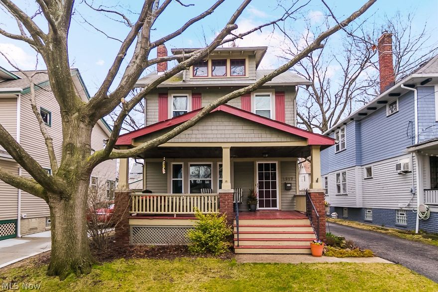 Welcome to 1557 Lauderdale Ave. in the heart of Lakewood close to dining, entertainment and shopping. This beautifully maintained 3 bedroom colonial features many new windows and has a fully fenced in back yard. Head inside to see the original hardwood floors, trim and built-in cabinets with leaded glass. The kitchen which includes all appliances is spacious and has direct access to the backyard which has a grill with built-in gas line great for enjoying those lovely summers outdoors entertaining. Head upstairs to the second floor featuring 3 bedrooms and a bathroom with ample storage space, restored floors and woodwork. The third floor which has tons of storage space can easily be finished as an additional recreation room area or even large "walk-in" closet. The basement has space that can easily be finished for an additional living area. The laundry room which includes the washer and dryer has a utility sink, shower and large workbench. The seller is offering a 1 year home warranty f