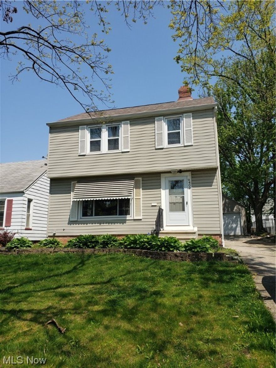 This Colonial provides an outstanding curb appeal -- with the grayish tone vinyl siding with white vinyl windows & trim which sets it apart from the neighbors. The spacious interior has recently been updated with easy to clean vinyl planking flooring accented with neutral coloring throughout, all white cabinetry in the kitchen and all appliances, plus the large living & dining rooms to make for easy & comfortable living. The covered patio is off the dining room overlooking a quiet rear yard, great for these summer months. The lower level features a rec room for that extra living space & a full bath.
