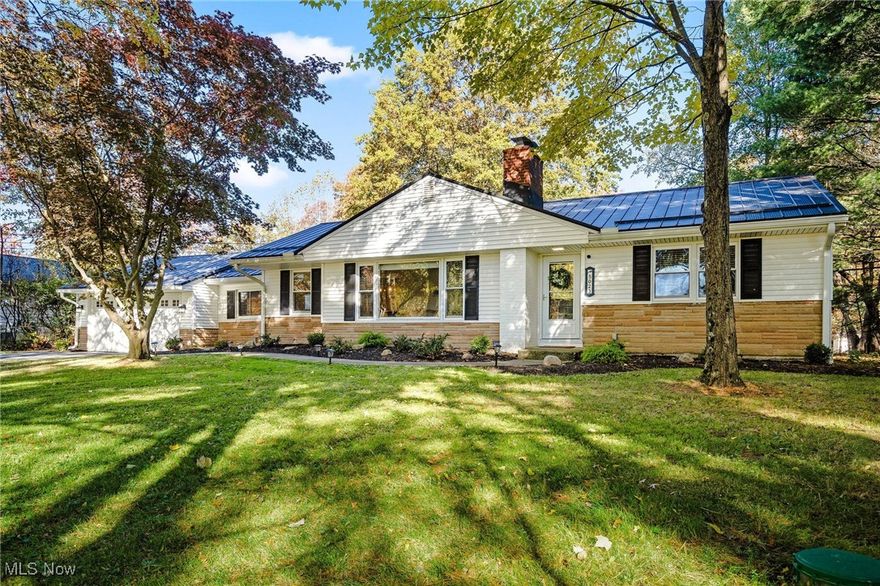 Move-in ready, fully upgraded ranch in the heart of Brecksville on a private, wooded .69-acre lot! This turnkey home perfectly blends modern design, comfort, and efficiency. The updated kitchen features granite countertops, soft-close cabinets, stainless steel appliances, and a second, brand-new LG refrigerator. Open and bright, the layout flows seamlessly into a spacious family room with a cozy fireplace and a large picture window overlooking the scenic front yard. Three bedrooms share a beautifully remodeled full bath with designer cabinets and tile. The fully finished basement offers a wet bar, waterproof Mohawk vinyl flooring, and plenty of space for entertaining, movie nights, or a man cave. Step outside to a brand-new stamped concrete patio surrounded by professional landscaping—ideal for hosting friends or relaxing in your private backyard. Major improvements include a new WeatherMax metal roof, seamless gutters and guards, updated jet septic system, Rheem HVAC, water heater, LED lighting, invisible dog fence, and custom blinds. Enjoy peace of mind knowing every major feature has been updated. Perfect for first-time buyers, growing families, or anyone looking for a move-in ready home with modern upgrades and timeless charm in desirable Brecksville, just 5 minutes from the new Valor Acres & 15 minutes from downtown Cleveland. See supplements for the full list of updates.