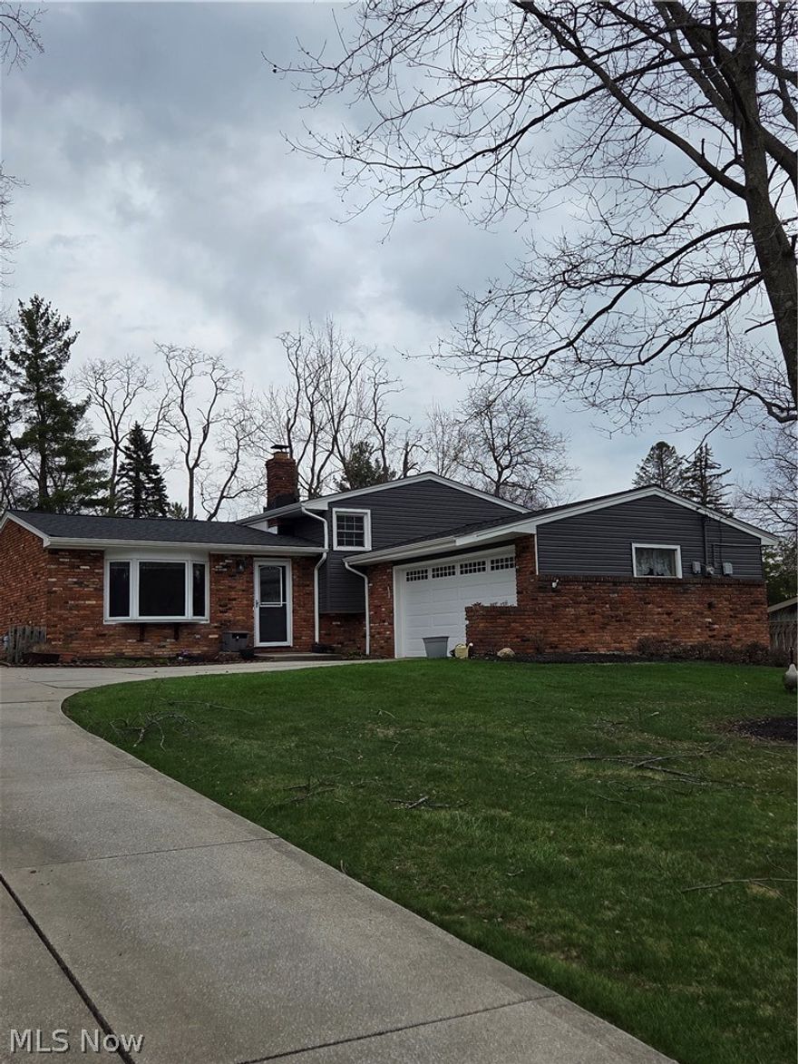 This 3 bedroom, 2 Full Bath Split Level Home 1498 sq ft. with an attached 2 car garage situated on a beautiful .45 acre hillside property is move in READY!  This home is a must see!  Just a few areas need a little cosmetic touch up.  Most of the big ticket items have been updated!  The Roof was replaced 2022, Siding and Gutters August 2023, New Electric Panel November 2023, Patio Door with shade inserts August 2024, 2nd Floor Bathroom Remodeled April 2025, Garage Door and opener November 2023,   Hot Water Tank Heater Replaced November 2021, Air Conditioning Replaced 2021 and Furnace installed 2014.  The seller still has one service left for the a/c and hvac system which will be completed in April. Quick possession. There is a raised garden bed and a fire pit in the back yard - for evening relaxation times! 
Schedule your showing today!