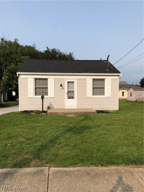 Wanting to "scale down"?? One size does not fit all! This is your chance-Move In Ready! All you need to do is unpack! Totally updated Ranch/Bungalow design. Enter from the rear wrap-around deck allowing privacy into the kitchen, featuring new counter tops, stove, refrigerator, microwave & additional shelving. Extra eating area and large pantry. Easily accessible remodeled bath. Bedroom with spacious double closets, living room with wall mount for TV. All interior fresh paint and new carpet. New roof & gutters. Enter the basement area which can be converted to a rec room for added living space, featuring glass block windows for safety. An oversized 2+ car garage with new door opener plus additional parking spaces for your guests. You must see to really appreciate the value of this home. Make this home your own or use as a rental opportunity. Close to hospital and many shopping areas for your convenience. Don't miss out on this great value and opportunity! Call Now!