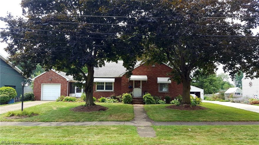 Attractive 4 bedroom, 2 bath Brick Bungalow situated on over a half acre lot with mature trees, shrubs and perennials.  This home has been very well cared for and loved...Eat in kitchen comes complete with electric range (less than a year old) and refridgerator (approx. 9 years old) and newer counter top. Spacious living room with woodburning fireplace, ceiling fan and plenty of natural light. The first floor includes 2 nice sized bedrooms, a full bath and stackable washer and dryer.  And, the hard Wood floors beneath the carpet have never been walked on!  The upstairs houses tandem bedrooms with built-ins and book shelves. Enjoy sitting in the breezway while looking out over your lovely backyard. This home is a one of a kind...country feel with convenience to shopping and restaraunts. Many updates have been completed in the past 10 years to include roof, breaker box, HVAC, some windows, water softner, dehumidifier and more. You need to see this lovely property...you will want to call