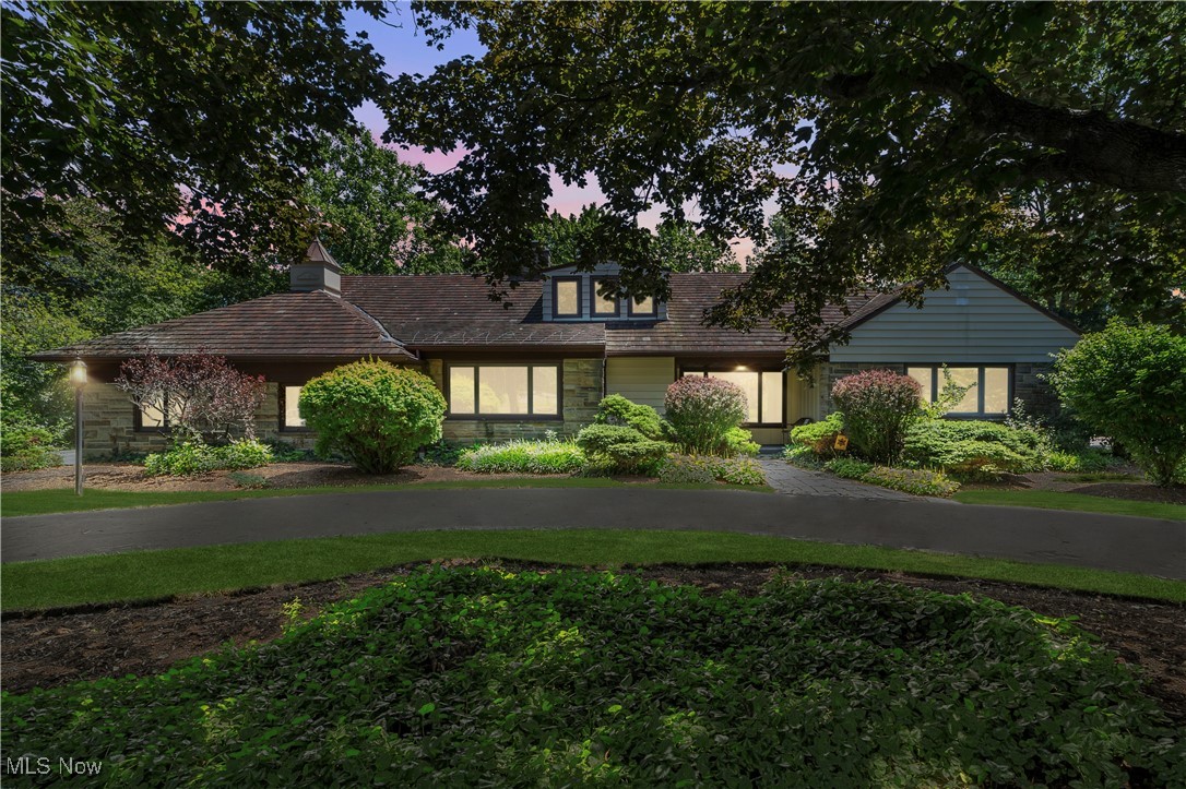 Welcome to this immaculately maintained and thoughtfully updated 4-bedroom, 2.5-bath Cape Cod, nestled on a pristine 1-acre lot in the heart of Pepper Pike. Just minutes from world-class dining, shopping, cultural institutions, and top-rated healthcare, this home offers the perfect balance of privacy, sophistication, and convenience. Step inside to discover timeless elegance and warm, inviting spaces. A formal living room and formal dining room set the tone for refined entertaining, while the spacious family room and beautifully updated kitchen create the ideal setting for everyday living. The kitchen features a charming breakfast nook with sliding doors that lead to a peaceful side patio, perfect for morning coffee or intimate al fresco dining. Enjoy year-round natural light in the stunning four-season sunroom, which opens to an expansive rear deck overlooking lush, landscaped gardens and a private backyard oasis. The first-floor primary suite and second bedroom, paired with 1.5 bathrooms and a convenient laundry room on the main level, offer the ease of one-level living. Upstairs, you'll find two additional bedrooms and a full bathroom, providing ideal space for family, guests, or a private home office. A finished basement adds versatility, perfect for recreation, a fitness area, or a second family room. Situated directly across from the Gates Mills Boulevard walking trails and enhanced by a circular driveway and impeccable grounds, this home has been lovingly cared for by the same owner for over five decades. Opportunities like this are rare in Pepper Pike, don't miss your chance to make this extraordinary property your own!