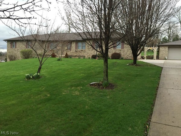 Spacious and open floor plan on the main floor, much of lower level finished to include a total of six bedrooms, 3 full baths, plentiful storage, 2 car attached garage and 2 car detached log on to see so much more