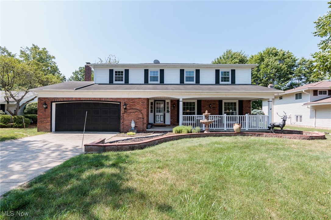Step into this beautifully maintained colonial in the sought-after Hunting Meadows neighborhood of Strongsville! This spacious 4-bedroom, 2.5-bath home sits on a generous 0.27-acre lot and offers room to grow, relax, and entertain. Inside, you’ll love the oversized living spaces, including a bright living room with a cozy fireplace and charming beamed ceilings that add character and warmth. The kitchen features granite overlay countertops for a sleek, updated look, rich cherry oak cabinets, stainless appliances, and flows effortlessly into the dining and family rooms. Upstairs, you'll find four generously sized bedrooms. The full basement adds extra storage and potential for future finishing. This home has been lovingly cared for and includes thoughtful features like a central vacuum system, triple-pane windows, and modern electric HVAC. Enjoy all the perks of the community—close to parks, playgrounds, and shopping. Don’t miss your chance to own this move-in-ready gem in Strongsville!