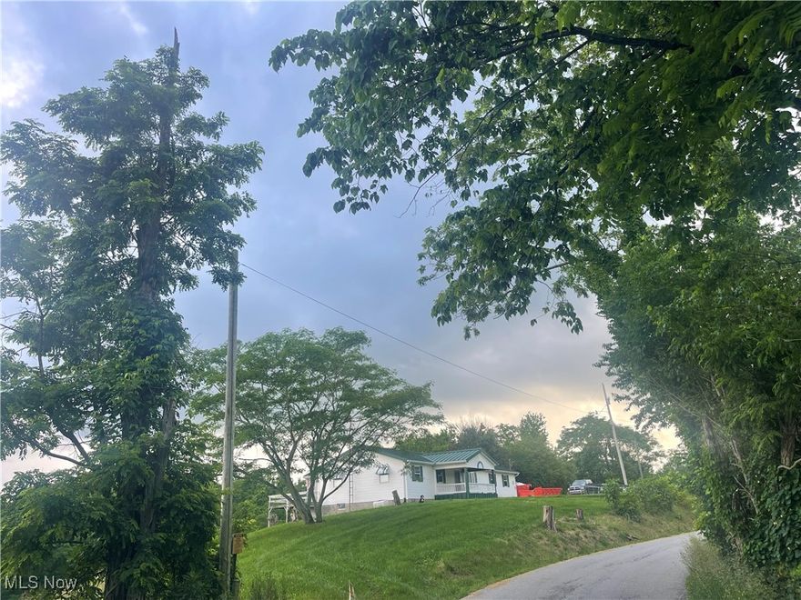 Country Setting 48 ACRES Wooded View!!  1-Story Ranch .. 3 Bedrooms 2-Full Bathes.. Master Suite with Full Updated Bathroom..
Large Kitchen with shiplap wall decore.. Full WALK OUT basement!!! Situated 0n over 48 +- Acres with a panoramic Tree Lined View!!