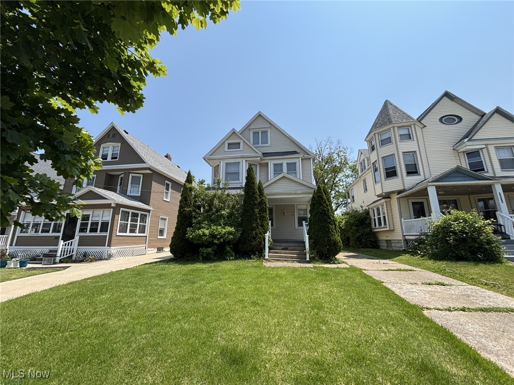 Spacious two level unit Lakewood double. Central Lakewood location. Four bedrooms and two full baths. One car garage parking. Nice yard with second story deck. Clean spacious unit with central air. Full basement for storage and laundry. Call for details.