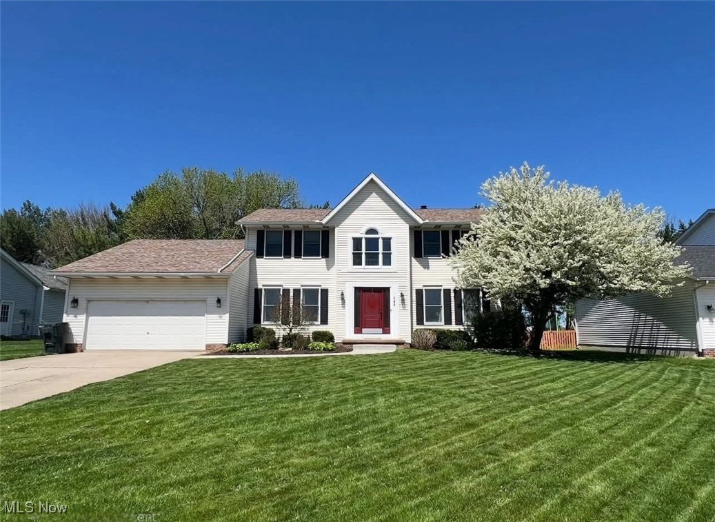 Beautiful, warm and welcoming 3 bedroom 2.5 bath Colonial in Wadsworth Ohio. Gorgeous wood flooring in the foyer, dining room and living room area. Warm and inviting kitchen with plenty of counter and storage space. Computer desk area, stainless steel appliances, gas stove and all appliances stay. Large kitchen Breakfast area plus a formal dining room. Great for entertaining or hosting a holiday gatherings. Beautiful oak throughout and Anderson windows give this home the feel you're looking for. Vaulted master suite with newly remodeled master bath. Remodeled full bath with skylight, 2 adorable large bedrooms. Finished basement area with potential for 4th bedroom, recreation area and plenty of storage. 2-3 car tandem garage with doors leading to the back yard area. Enjoy the summer evening on the new cement patio. Perfect for hosting outdoor gatherings. Updates include, new roof, fresh paint throughout, new AC unit, new furnace, new water heater