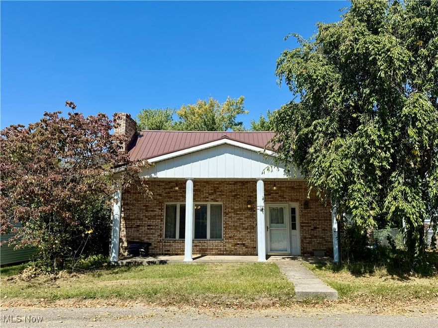 Charming Three-Bedroom Home with Stunning Woodwork & Vaulted Ceilings.

Step inside this beautiful three-bedroom, one-bath home featuring a spacious and inviting layout. The heart of the home is the great room with vaulted ceilings and natural stone accents, perfect for relaxing or entertaining. Throughout the house, you’ll find rich woodwork, built-in features, and timeless character that make this home one of a kind.

The kitchen boasts solid oak cabinets and abundant built-in features, offering plenty of storage and functionality for the home chef. Just off the kitchen, the generous-sized dining room is perfect for hosting dinners and holidays with ease.

Enjoy the outdoors year-round on the massive covered patio/porch area, ideal for gatherings or quiet mornings. The home also features a newer metal roof for peace of mind and lasting durability.

Each of the three bedrooms is generously sized, providing comfort and flexibility. The master bedroom is located on the first floor, complete with a huge walk-in closet. Two additional walk-in closets in the hallway provide exceptional storage space.

This home offers a perfect blend of charm, craftsmanship, and functionality — ready for you to make it your own!