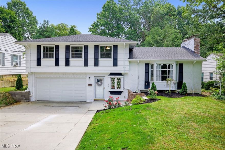 Welcome to 257 Sand Run Road—a beautifully maintained and move-in ready 3-bedroom, 2.5-bath home offering over 2,090 square feet of thoughtfully designed living space. This inviting property combines timeless character with numerous modern upgrades, making it a perfect fit for families or anyone seeking a cozy, updated home in a convenient location. The home boasts a spacious and versatile floor plan with newer laminate flooring throughout and elegant touches like fresh light fixtures and ceiling fans throughout. The bright and welcoming living spaces flow seamlessly and feature a cozy fireplace, oversized windows, and charming wrought-iron details. The sunroom has been refreshed with new flooring, adding even more usable space perfect for relaxing or entertaining. This home has seen a long list of updates including a brand-new sump pump installed in 2025, a new hot water tank in 2023, and a new roof in 2016. The kitchen is equipped with newer appliances. The exterior is equally impressive with a new driveway poured in 2023 and a new garage door. The curb appeal is picture-perfect with classic black shutters, tasteful landscaping, and a welcoming front entrance. Out back, enjoy a generous yard and a covered patio that’s great for gatherings or quiet evenings at home. Don’t miss out on this gem and schedule your private showing today!