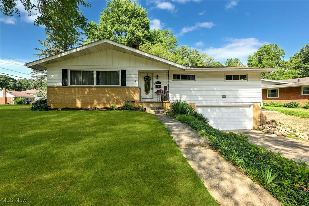 Move right into this three bedroom, two full bath ranch home! The spacious living room features lots of natural light, hardwood flooring, and a gas fireplace with stone surround and built-in shelving. New dishwasher, refrigerator, and range stay with the home and the dining area is conveniently located right off the kitchen. The primary bedroom has its own private full bath. Additional two bedrooms with hardwood flooring and the second full bath are on the first floor as well. The basement features the second fireplace and a plenty of additional living space that would be perfect for a recreation room or home office. The large yard is fully fenced and ready for you to enjoy the upcoming months on the patio! Extra deep two car garage for plenty of storage. Schedule your private tour today! OPEN HOUSE Sunday, July 27th between 1:00 - 3:00 p.m.