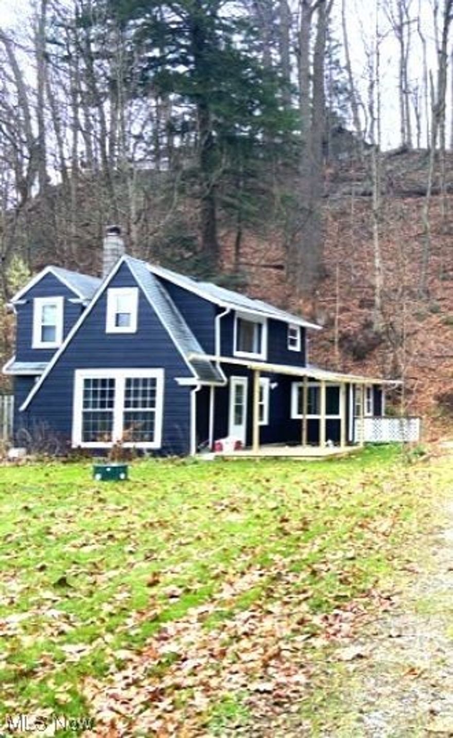 Super Charming 3 Bedroom 2 Full Bath Home on a Scenic acre lot in Willoughby Hills. NEW DECK ADDED PERFECT FOR RELAXING AND ENTERTAINING !!! Updated cute Kitchen and Dining Room /All Electric Home (never pay a gas bill). Call today to schedule a showing.