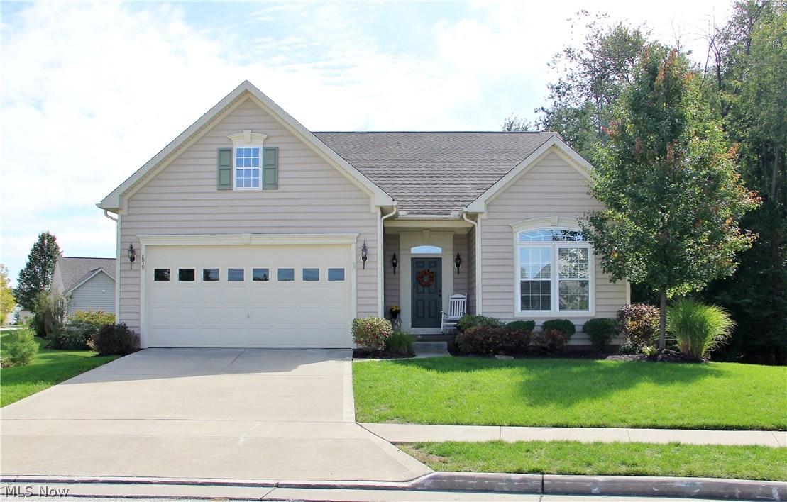 Welcome to 879 Highridge Lane! 4 Bedroom 4 Full Bath! Must See Open Floor Plan Move in Ready with LOTS of space! Walk into an open foyer. Large Great Room w/ vaulted ceilings opens to a custom kitchen w/ breakfast bar. Eat-in-kitchen opens onto a gorgeous deck perfect for a sunny day. Sunroom makes a perfect space to relax on a cool evening or make into a sunny office space. Glass French Doors open to a large office or make into a dining room. FIRST FLOOR MASTER features a recessed ceiling, Walk-in Closet, On-suite w/ Double Sinks! 1st Floor bedroom features vaulted ceiling & close by full bath, would make a perfect In-Law suite! Upstairs Loft makes for a great hangout area & overlooks the great room & kitchen. 2nd Floor Bedroom also has it's own full bath. Finished WALK-OUT BASEMENT makes a Great Rec Room & opens to a patio out back. Basement also features a 4th Bedroom w/ LARGE Window, Full Bath, EXTRA BONUS Room would make a great workout room/office. HOA $80/monthly covers landscap
