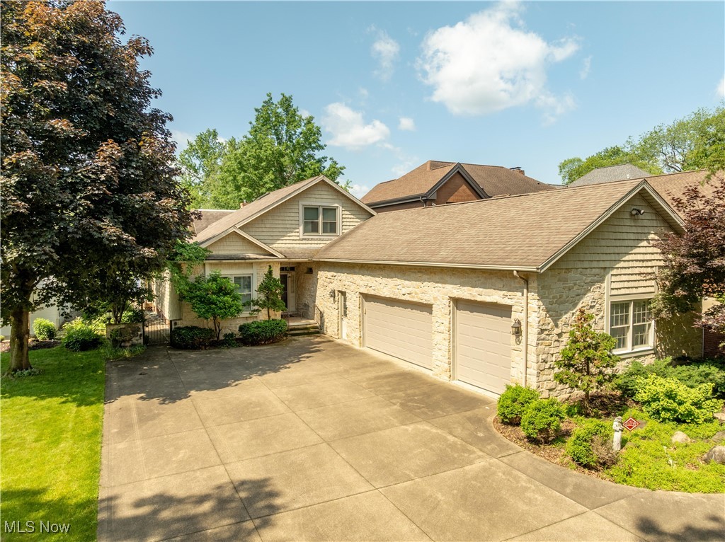Discover the essence of lakefront living in one of Jackson Township’s most sought-after communities. This spacious home is over 3000 square feet and features a main-level master suite, perched on a stunning spot along the picturesque Lake Cable. Imagine a lifestyle where you can step out your door to fish, kayak, or paddleboard, creating cherished memories with family and friends. With three additional bedrooms upstairs and oversized great room and sunroom make it perfect for entertaining! This home is ideal for those who love to gather with family and friends or simply unwind by the water. Enjoy the best of every season, from the annual Fourth of July fireworks display to afternoons spent at the Lake Cable beach with its beloved rope swing. Close to top-rated schools, parks, and shopping, this home offers more than just space—it’s a lifestyle that won’t disappoint.