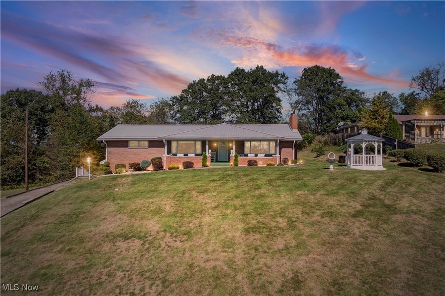 BEAUTIFUL VIEWS, SPACIOUS LIVING CAN BE YOURS!  Looking for the perfect place to call home?  This 3-4 bedroom brick ranch has it all--plenty inside and out to customize to your liking, beautiful views and ahh-inspiring spots for relaxing or entertaining!
This 1735 sq. ft. home, built in 1968, was treasured by one owner who maintained it faithfully.  You'll love the large front porch and side gazebo addition--perfect for morning coffee or watching the sunset and a mason built stone BBQ--ideal for cookouts and weekend get-togethers.  The oversized 2 car, heated garage and workbench area makes parking easy and a breeze for storing tools, shelving garage/auto supplies and more.  The generous front and back yards provide much room for activities, pets, gardening and room to grow with a pool or hot tub.  Out back, a new, Amish built shed provides extra storage for yard and gardening equipment, porch furniture and entertainment  essentials.  Brimming with natural light from ample windows, this home features 3 generously sized bedrooms, 2 full baths (plus a basement toilet and shower hookup), a full kitchen with custom built breakfast bar seating area, a front sitting room, family room and formal dining room with French doors leading to an outside patio.  The basement features a brick fireplace, huge custom built shelving to store totes and treasures and space for laundry needs and hanging clothes, canning activities and more.  If an open floor plan is what you crave, this home could transform to meet your vision for even more openness and beauty!  The possibilities are endless, yet the current layout is still perfect to comfortably enjoy for years to come.  This coveted property is convenient to Route 7 access and downtown/local amenities, yet nestled away to enjoy cozy country benefits with serene surroundings!  Leased Hot Water Tank!