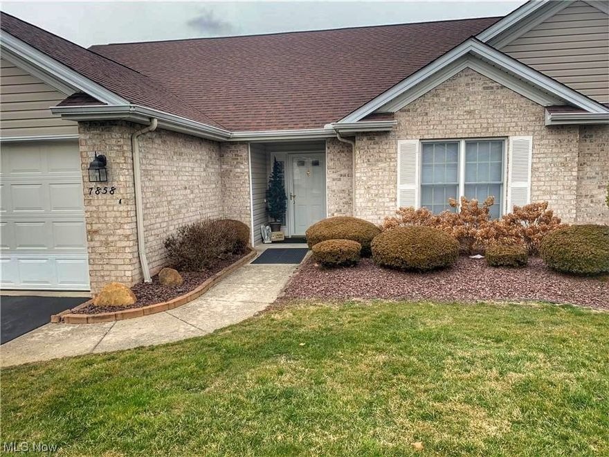 Embark on a new chapter in the comfort and convenience of 7858 Walnut St. unit A! This 2-bedroom, 2-bathroom condo is your gateway to a life of ease and enjoyment in a vibrant, well-maintained community. Imagine relaxing on your private patio, enjoying a cup of coffee and basking in the morning sun, or gathering with loved ones in the spacious living area. Everything conveniently located on one floor living. The master bedroom features an en suite full bathroom with generous soaking tub and separate step in shower, as well as dual sink vanity.  Vaulted ceilings in the living room offer spacious comfort while relaxing in front of the fireplace. The dining room features beautiful tray ceiling. Move in ready just awaiting your personal touches & style!