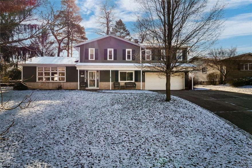 This split-level home sounds like a fantastic place to live! With over 2400 sq. ft., there is ample space for a family or guests. You’ll enter the home through the large foyer with ceramic tile & plenty of space to unload your coats/shoes!  The living and dining room are both impressive, featuring laminate flooring, a vaulted ceiling and a large bay window that allows plenty of natural light to fill the space. The remodeled kitchen is a highlight of the home, with beautiful hickory cabinets, laminate flooring, new stove, refrigerator, and microwave plus plenty of room for seating 4-5 comfortably.  The family room has a wood burning fireplace and built-in shelving, it's the perfect cozy spot to gather with loved ones. There's a first floor BONUS room that could be used as an office, play/hobby or potential bedroom.  A convenient, newly renovated first floor bathroom is an added BONUS! Moving along to the HUGE master bedroom complete with skylights, a sitting area and walk in closet is a celestial retreat.  Enjoy three other nicely sized bedrooms, all featuring brand new closet doors with plush carpet.  The full bathroom upstairs has been completely updated with double sinks, new tub/shower, flooring, toilet and lighting.   But wait, there is MORE!! The finished basement, complete with new carpet, is a great space for relaxing. Off the family room, you'll find the sought after three-season room, allowing you to enjoy the outdoors while staying protected from the elements. If you need to unwind, why not walk out to the backyard and enjoy the HOT TUB with your own private brick patio!  One last BONUS...Optional membership for a nominal fee is available for the Wyoga Lake Estates Homeowners Association which includes access to the private lake where you can enjoy swimming, kayaking, fishing, kids playground, volleyball/basketball courts, outdoor pavilion & social events. Overall, this split level home has EVERYTHING you need for comfortable and enjoyable living! HURRY!