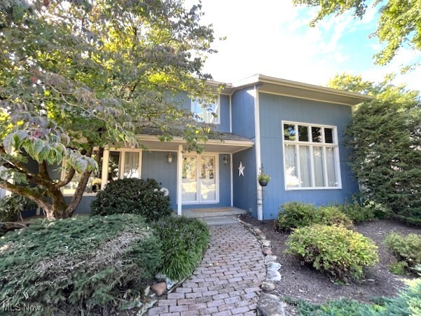 This beautifully maintained 2-story home with contemporary flair features 4 bedrooms and 2.5 bathrooms, and is move-in ready. Enter onto the relaxing front porch, into the slate foyer, and to the formal living and dining rooms to the right and left. Enjoy the updated oak kitchen with granite counters, tiled backsplash, laminate floors, stainless appliances (5 years), and a breakfast bar area, as well as a desk area. You will love to entertain in the spacious living room, which opens to the first-floor family room w/cozy fireplace. Spacious master suite with balcony, large walk-in closets, and remodeled glamour bath w/walk-in shower. The family room opens through a new slider to the deck, stamped concrete patio, hot tub, and beautifully landscaped backyard. Extra parking pad. Located close to park, highways, restaurants and shopping.