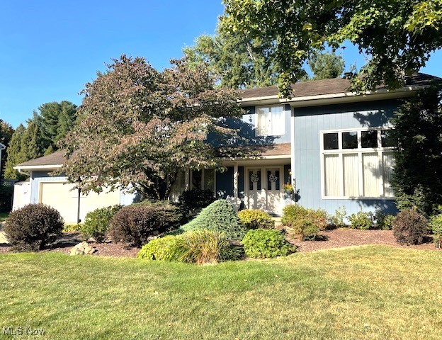 This beautifully maintained 2-story home with contemporary flair features 4 bedrooms and 2.5 bathrooms, and is move-in ready. Enter onto the relaxing front porch, into the slate foyer, and to the formal living and dining rooms to the right and left. Enjoy the updated oak kitchen with granite counters, tiled backsplash, laminate floors, stainless appliances (5 years), and a breakfast bar area, as well as a desk area. You will love to entertain in the spacious living room, which opens to the first-floor family room w/cozy fireplace. Spacious master suite with balcony, large walk-in closets, and remodeled glamour bath w/walk-in shower. The family room opens through a new slider to the deck, stamped concrete patio, hot tub, and beautifully landscaped backyard. Extra parking pad. Located close to park, highways, restaurants and shopping.