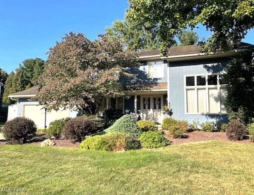 This beautifully maintained 2-story home with contemporary flair features 4 bedrooms and 2.5 bathrooms, and is move-in ready. Enter onto the relaxing front porch, into the slate foyer, and to the formal living and dining rooms to the right and left. Enjoy the updated oak kitchen with granite counters, tiled backsplash, laminate floors, stainless appliances (5 years), and a breakfast bar area, as well as a desk area. You will love to entertain in the spacious living room, which opens to the first-floor family room w/cozy fireplace. Spacious master suite with balcony, large walk-in closets, and remodeled glamour bath w/walk-in shower. The family room opens through a new slider to the deck, stamped concrete patio, hot tub, and beautifully landscaped backyard. Extra parking pad. Located close to park, highways, restaurants and shopping.