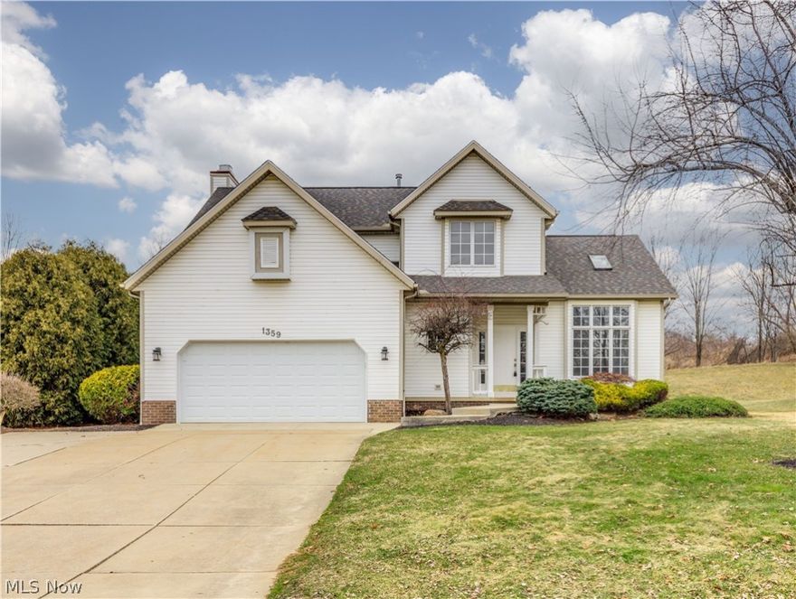 Welcome to this beautifully landscaped 3 bedroom, 2.5 bath colonial in Tallmadge. Upon entering the foyer, you will notice how much natural sunlit is in the living room from the large windows and skylight and open to the staircase. The kitchen flows and is open to the dining room and the family room with a tiled fireplace that is a wood burning or can be used with gas with recessed lighting over it. The fully equipped stainless steel kitchen appliance really makes this home ideal to move right in. Ample storage and cupboard space to help tidy things up. The dining area has access to the backyard. A half bath on the main floor is ideal for guests including a 1st floor dedicated laundry room with storage. A spacious master suite that is connected to the master bath that offers a double vanity, jacuzzi tub and a stand-up shower. You will find 2 more large bedrooms to accommodate a large or growing family. A full bath completes the upstairs. A partially finished basement gives room for ext