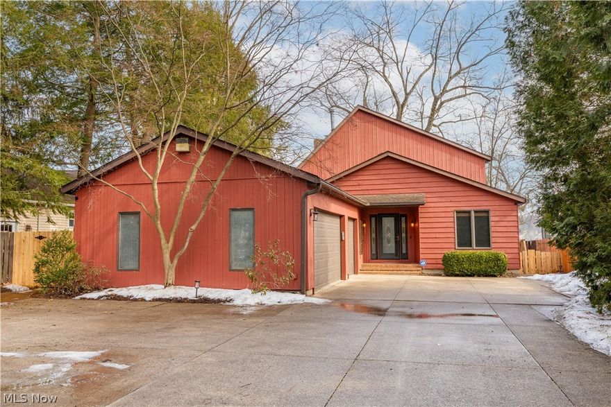 Welcome to lake living at its finest in the sought-after Point Comfort neighborhood of beautiful Portage Lakes. This exceptional waterfront home blends comfort, quality updates, and thoughtful design with stunning water views.
Enjoy 75 feet of boardwalk leading to your private 30-foot dock with kayak launch and updated retaining wall (2021). The tiered backyard features professional landscaping and a private putting green—perfect for relaxing or entertaining by the water.
Inside, the great room showcases vaulted ceilings, exposed beam detail, a fireplace, and double sliding doors that fill the space with natural light and open to a large composite deck (2021) overlooking the lake.
The main floor includes a spacious master suite with his-and-her walk-in closets and an updated bath with double sinks and walk-in shower. An additional bedroom on the main level offers flexibility for guests or office space. The large dining room features built-ins and a wet bar, while the sunroom provides peaceful lake views. The applianced kitchen includes a center island and generous workspace.
Upstairs, a loft overlooks the great room with beautiful water views. Two additional bedrooms complete the second floor, one with sliding doors to a large private deck.
The finished walkout basement offers newer carpeting, a large wet bar, abundant storage, and a convenient half bath—ideal after a day on the lake.
Major updates include whole-house generator (2022), furnace, A/C and hot water tank (2022), main floor wood floors, deck and railing (2021), plus dock, seawall, retaining wall, and landscaping (2021).
A three-car garage and expansive driveway with extra parking provide ample space. The deep, private front yard enhances the peaceful setting.
A rare opportunity to own a beautifully updated lakefront home in one of Portage Lakes’ most desirable neighborhoods.