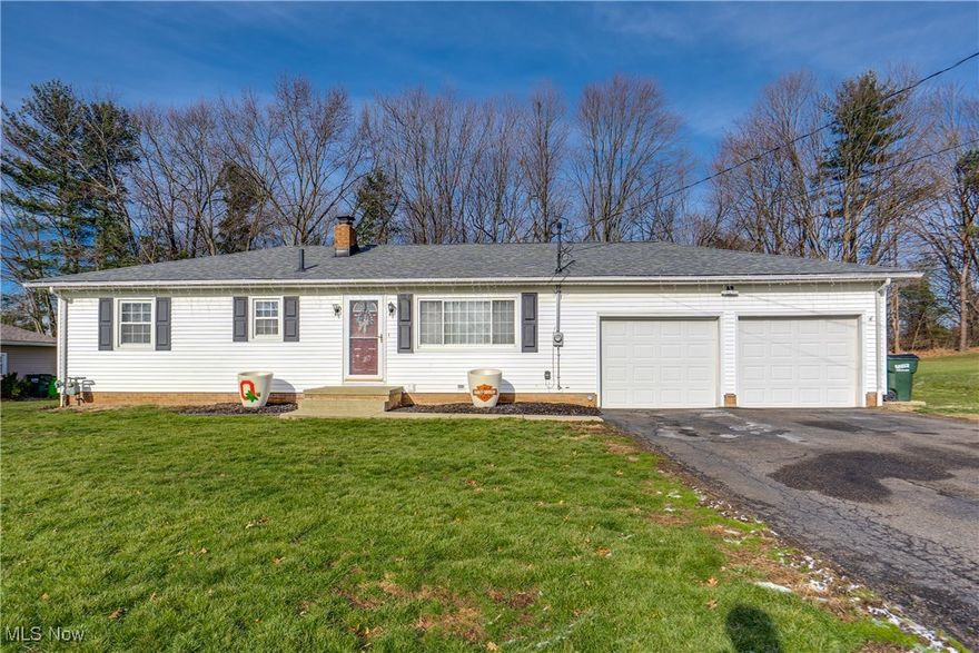 Well-maintained ranch home tucked away on a quiet street in desirable Jackson Township! The main level features a spacious living room and three bedrooms, with original hardwood flooring preserved beneath the carpet. The full bathroom was remodeled in 2024, offering updated finishes and a fresh feel. The kitchen includes painted cabinetry, laminate flooring, countertops, and a pantry. French doors off the kitchen lead to a wooden deck overlooking the fully fenced, private backyard, perfect for relaxing or entertaining. Downstairs, the partially finished basement adds valuable living space, including a rec room with a fireplace, and a convenient half bath. The exterior features include an oversized 2.5-car garage with automatic openers and a man door, as well as ample storage. Plus, the backyard comes fenced-in. Plus, the home is near shopping, schools, and parks! Don't miss your chance to see this beautiful home; schedule your showing today!