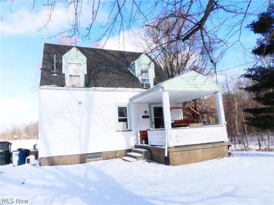 A cozy home with 2 acres of land is readily awaiting new owners.  This home has newer carpet, stainless steel appliances, a newer heat pump, and plenty of storage space.  The two car detached garage has been renovated, but it can still be used to house your cars.  The current owners use that space for a workout area.  Come take a look at this home, you will not be disappointed.