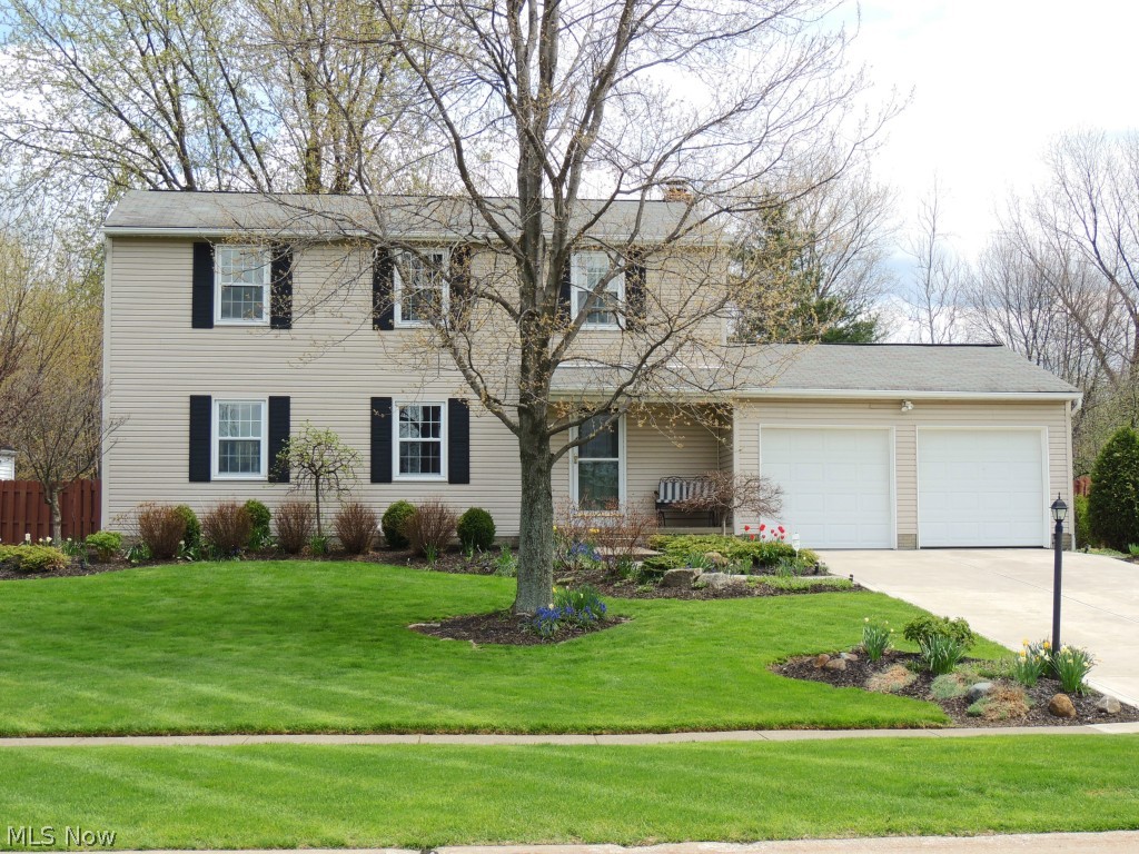 Gorgeous 4 BR colonial w/ everything updated throughout! Sits on a private fenced lot w/views of backyard. HDWD flr foyer, LivRm & Kith! Lg & DinRm w/ crown moldng. Stunning LivRm w/custm FP & WD fls. & slider to huge deck! Fabulous kith/wood flr, custm cabs w/pull outs, island, pantry pull-outs, Corian & Granite countertops, newer stainless appl's, wine frig! Half bth/wood flr. 1st flr laundry & lower laundry. 2nd Flr: 4 BRs, 2 BAs Mst BD w/wall of closets & private BA! Carpetng in DR & BDRMS. Updated Main bth. Wonderful fin'd lower lvl w/Great rm, play & storage area. ALL woodwork has been replaced! Tankless Water Heater! Newer Furn/AC! 2 car attached garage w/ water. Amazing lge custom tiered deck, roof 2014! Newer shed, above gr pool. Beautifully landscaped. True pride of ownership. Great Location. Great school system. View before you build!