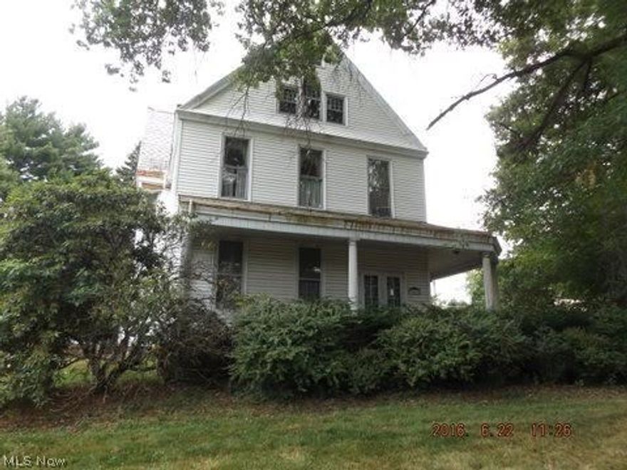 Large 7 bedroom 2 bath home on over an acre lot right in town. Beautiful woodwork  and fireplaces throughout the home. Large barn and outbuilding.