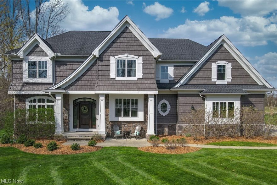 Custom built in 2015 by one of the area's most discerning builders, "Premier Custom Builders", this masterpiece is a true representation of perfection. Not one single detail was spared in the building of this home! This home features an entertainers dream first floor with open kitchen and great room, which flows out to a paver patio overlooking 2400 acres of the Ladue Reservoir Preserve!  This is truly a one of a kind property in this area! The chef's kitchen is complete with ENORMOUS walk in pantry along with custom designed Amish built cabinetry! Also on the first floor is a dining room/sunroom, office, and a large mudroom with Amish built-in's. The 2nd floor is AWESOME! The master suite is complete with Glamour bath and HUGE walk in closet. One of the coolest features you will find is that the laundry is attached to the master suite as well as the hallway, but separated by doors to still keep privacy! GENIUS! 1 bedroom has a private in suite bath, and the other 2 bedrooms share a ja