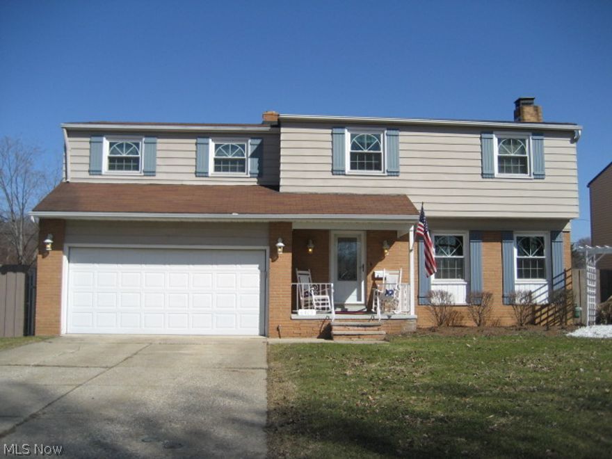 Beautifully REMODELED*Welcome Home to this 5 bedroom home-Nothing to do but Relax & Enjoy**GREAT Layout with many upgrades*Stunning Gourmet Eat-In  Kitchen complete with CORIAN Counters, Breakfast Bar, KRAFTMAID Cabinets,  Newer Appliances, Ceramic Tiled Floor, view of Fireplace & Wine Shelf*Fantastic Family Room with Ceramic Tile  & Glass Sliders Opens to Large Inviting Deck & FENCED in yard-great for entertaining*REMODELED Bath has New Cabinet, Flooring & Freshly Painted in Todays Color*Formal Living Room with Wood Burning Fireplace & Heatalator for extremely LOW UTILITIY bills*All Bedrooms are good size- 4 have BEAUTIFUL HARDWOOD*2 Car ATTACHED garage w Storage + Pull Down Attic Storage*NEWER DETAILED WINDOWS & LIGHTING Throughout*Full Basement*UPDATED ELECTICAL*As soon as you Walk in the NEW Front door you will want to call this HOME*Relax on Front Porch or enjoy the PRIVACY of Fenced Backyard Desk* Everything has been done for you!