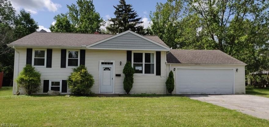 Great opportunity! Bring this property back to its full potential. Ranch w/ partially finished basement. Park like setting backyard Bedford Hts School district.