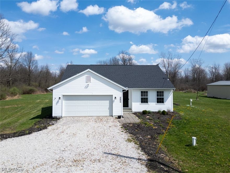 Why build when you can move right into this like-new 2021 ranch on over 1.6 private acres?

This beautifully maintained home offers 3 bedrooms, 2 full baths, and a full basement, providing both comfortable main-floor living and room to grow. The open-concept layout features vaulted ceilings in both the great room and kitchen, creating an airy, spacious feel. The kitchen includes a large island, stainless steel appliances, and an eat-in dining area, with sliding doors leading to a private backyard—perfect for relaxing or entertaining.

Enjoy an abundance of natural light throughout thanks to the large windows that brighten every space.

The primary suite offers a true retreat with a private en suite bath and a walk-in closet.

This home is loaded with upgrades and thoughtful features, including a cozy fireplace, attached 2-car garage, Tesla Level 2 charger, and Starlink satellite internet system. 

The extensive water treatment system includes a pre-filter, dual softeners, iron filter, and post-filter, along with a high-performance 3-phase water pump that provides excellent water pressure throughout the home.

You’ll also appreciate the whole-house generator hookup—simply plug in your generator outside, and the interior switch allows you to power the home during outages with ease.

Enjoy newer construction without the wait, plus added upgrades you won’t find in a standard build—all in a peaceful, private setting.