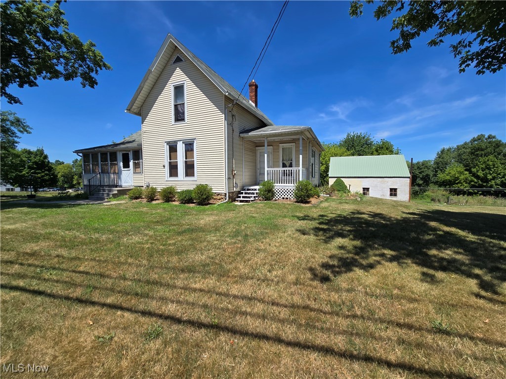 Great opportunities!! This very well loved 1890's Farmhouse is just waiting for you to make it yours!!! This home offers
large rooms, the master bedroom full bathroom, enclosed from porch and open porch on the main level! Upstairs you
will find 2 additional bedrooms and a large attic with walk in access. The full basement is a "walk out" and offers some
drywalled rooms, full bath, storage and 2 outside entry doors! There is a large garage, lean-too's, barns and carport too!
Beautiful, wooded lot that offers 4.57 acres!! So close to everything yet in a country style setting!! This lovely
opportunity is just waiting for your personal touches!