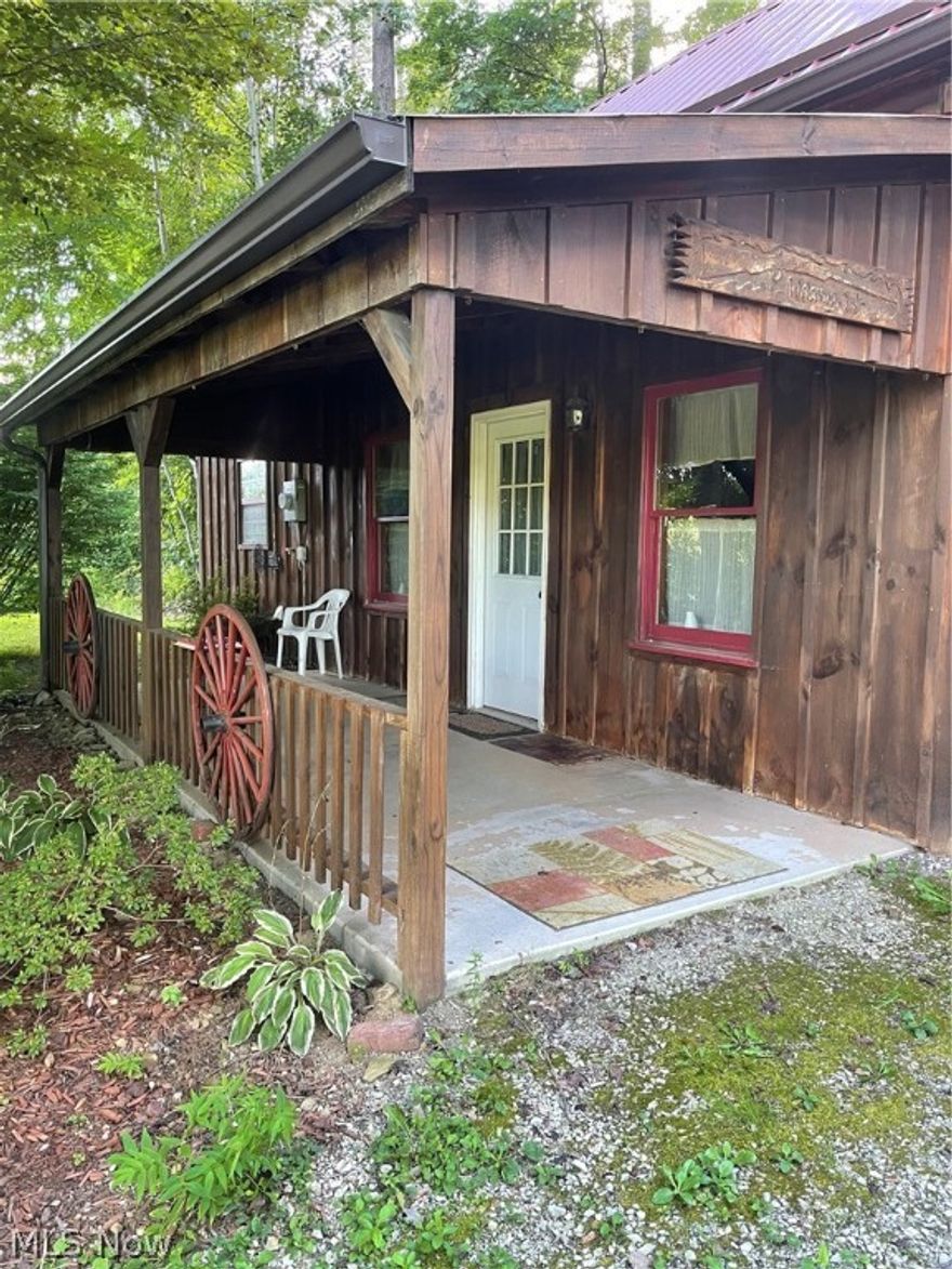 This property has two cedar cabins that share all utilities including water, Septic, electric, propane; The Big Cabin ( 45 ' x 13')  has a small private bedroom and living space with an open kitchen in between; extra space on the second floor with a ladder access.  Home is heated with propane and extra electric fireplace; Cabin stays cool in summertime due to allot of shade; Small shed included with the big cabin.
Small cabin is much smaller but great for one person! Small cabin ( 20' x 12.5')has electric base heat and potential hook up for propane with a new deck out back for additional privacy.  
This property is extra special !  All buyers must be pre approved for showings.