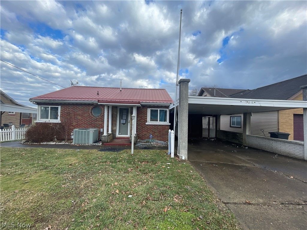 Photo of 706 Vine Street, Tiltonsville, OH 43963 (MLS # 5193768)