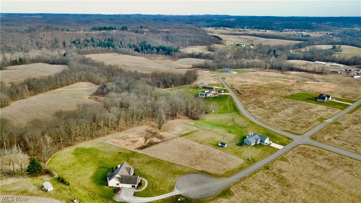 The only difference between a Dream and a Goal is a Plan. We can help you with that plan to build the home of your dreams in the wonderful Heritage Run Subdivision. East Muskingum Schools. Paved Streets. Take in the views of the surrounding area. Underground utilities include gas and electric. Public water available.