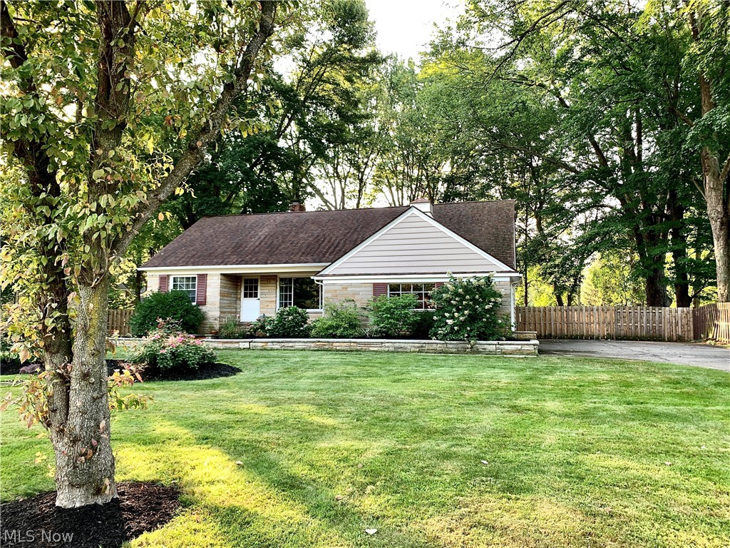 Welcome to this stunning agent owned 4 bedroom, 1.5 bath Cape Cod in South Mentor. The beautiful original hardwood flooring flows throughout the 1st floor and compliments the tasteful, modern updates throughout the home. With a large stone fireplace in the living room and huge windows overlooking your yard, you will feel right at home. Kitchen offers space for dining, a pantry and includes appliances. You'll find 2 bedrooms upstairs with additional loft space which is great for a kid’s play room or office. Both bathrooms have been completely renovated with modern updates. Newly finished basement with workshop and an additional room that provides plenty of space for storage. Manage the homes heating and cooling with the SMART thermostat. The huge park-like backyard includes a fire pit and is fully enclosed with a privacy fence, perfect for dog owners and/or kids. Hurry now, this home won't last long!
