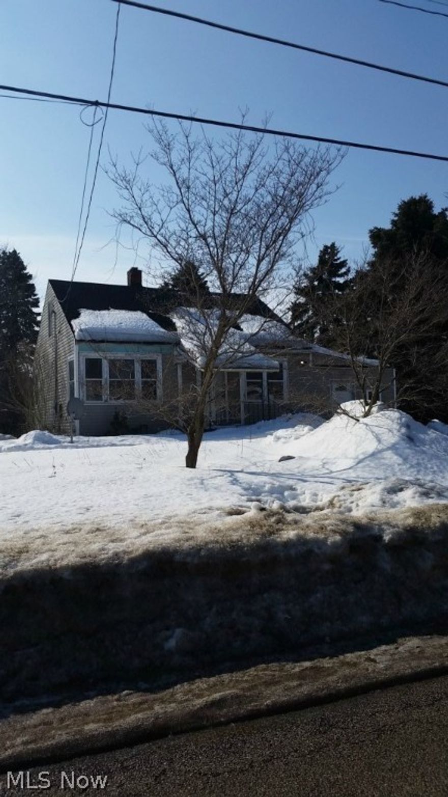 3 bedroom cape cod with cozy kitchen and big family room with attached garage.