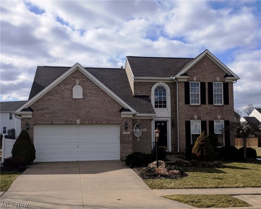 Absolutely mint condition 2 story home in Highland Creek / North Canton CSD containing 2,373 sq ft including the finished LL Bedroom.. This home boasts 4 BD (1 BD in LL) , 2 1/2 Bath, 2 car garage, 1st floor Laundry & Master Suite. The roof has just been replaced and includes a warranty and the carpet in the great room has also been replaced. There is a very open and airy floor plan with a 2 story foyer as well as vaulted ceilings in the Great Room and Dinette with views of the 2nd floor walk way and loft. The 1st floor Master Suite has a walk in closet and a spacious private master bath with a shower, garden tub and double sinks. The fully applianced cherry kitchen has plenty of cabinets and countertop space ideal for entertaining large groups. The beautiful Sunroom has a door which leads to a private back patio overlooking the back yard and storage shed. This lot is located beside the permanent neighborhood green space allowing you more privacy and room to roam. This subdivision also