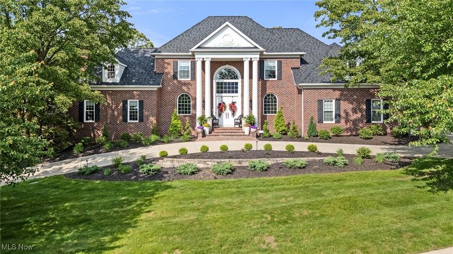This stunning home looks like it belongs in Architectural Digest!  From the moment you step into the foyer with its grand chandelier, you’re greeted by a seamless open-concept design that flows through the living room, great room, dining area, and spacious eat-in kitchen with wet bar.  The kitchen and the foyer lead to a grand, step down great room complete with a beautiful fireplace.  Featuring 4 bedrooms, 5 full baths, a fully finished 46x26 walk-out lower level recreation room with kitchen and full bath.  This residence is thoughtfully and tastefully updated throughout.  The chef’s kitchen is a culinary dream, showcasing a crumbled matte-edge granite island, KitchenAid stainless steel appliances, double oven, and wet bar-perfectly designed for effortless entertaining. The kitchen opens to an expansive Trex deck with gorgeous views ideal for outdoor dining and relaxation. Home features include 4 fireplaces; gas starter and wood-burning option, perfect for cozy evenings.  Wall of windows across the back of the home, flooding the space with natural light and offering breathtaking views of the private backyard.  Travel to the second floor where you’ll find the 26x17 owners suite with a warm and inviting sitting area with fireplace, luxurious en-suite bath, walk-in closet, and stunning light fixtures.  Three additional bedrooms include an en-suite private bath, while the other 2 share a Jack and Jill bath. A secondary patio off the lower level offers additional outdoor living space complete with a small serene pond and cascading waterfall.  Don’t miss your chance to own this remarkable home in a coveted development.