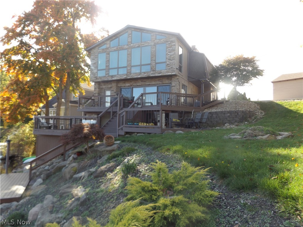 Situated on the main lake with a double Lot. Private dock. Take your boat for an evening cruise with dinner every night. Enjoy the clubhouse menu and festivities. Be part of a fun loving community with plenty of social activities. Retreat into the privacy and serenity that nature has to offer. Ths remodeled and ready to move into home offers three floors of ample living space. Walk out lower level leads to the tiki bar, and a three tiered deck. It has built in closet space, living and sleeping area, full bath, laundry, and storage. The main level boosts lake views from most windows. Upstairs master suite, two additional bedrooms, full bath with jacuzzi tub, office/living space, and beautiful loft. Two fireplaces. 2 car attached garage and shed. New cement driveway. 2017 Roof 2019 Furnace. All upgrades are from 2012 and forward. Make a lifetime of memories in this rare find at Willowdale​​‌​​​​‌​‌​​​‌‌​​​‌‌‌​​‌​​‌‌​​​​ Lake.