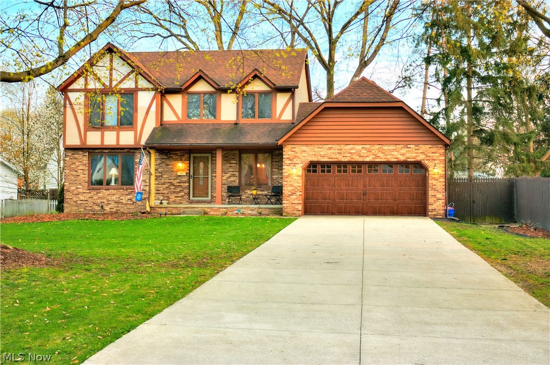 Fantastic Silver Lake estates beauty! Enjoy Silver Lake privileges: picnic, swim, fish and boat! Attractive curb appeal with tudor style design. Open kitchen with solid surface counters! Eat-in nook and formal dining room! Sun porch and completely fenced yard! 1st Floor Laundry! Gorgeous hard wood flooring! Spacious bedrooms with plenty of closet space! Master bedroom with private bath and walk in closet! Lots of details to include crown molding, pocket doors between the living and family room, new carriage style garage door, new front door! Finished recreation room in the lower level! This is a must see and will sell quick at this price! Schedule your showings today!