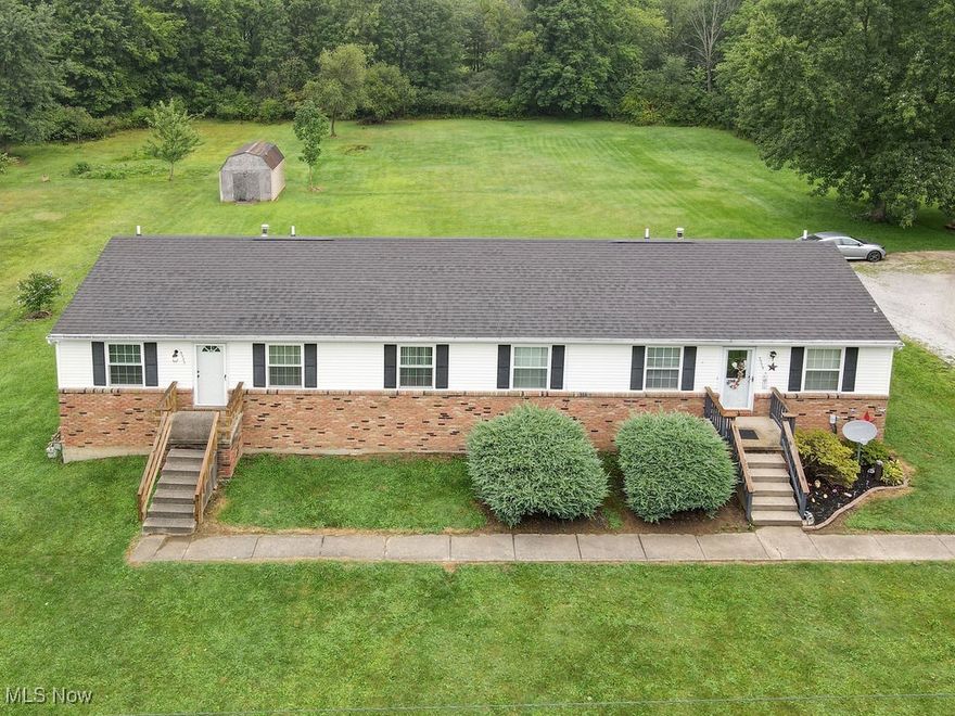 A duplex on an ACRE of land?! 3 bedrooms with a possible 4th in the basement? This sounds like a winning situation to live in one and rent the other to someone you know, or otherwise. Yes, a lot of people say that, but they probably don't have land to roam, 2 attached 2 car garages, 1,000 ft2 each and the bedroom possibilities.  Updates from the seller include: Unit 3335: newer windows with lifetime warranty, blinds, some new plumbing, water filter and softener, New furnace, A/C, Hot water tank and Fridge. Unit 3339: Furnace and Hot Water Tank, glass sliding door for the walk-out basement and half bathroom was added on lower level.  Approximate age of the roof is 2016. Easy to show and yes, of course the personal items will be removed before closing so you can either move right in, or rent. Note that the photos are of the unit being shown, the other unit is occupied and will be shown once under contract. The seller says it's nicer. Take advantage of owner-occupant interest rates, or add this one to your investment portfolio.