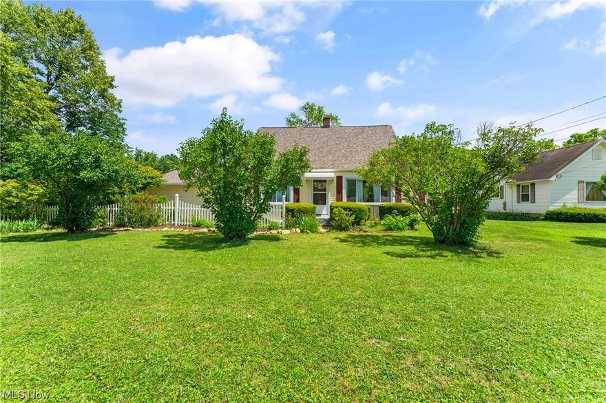 Welcome home to this cozy 3 bed, 2 full bath cape cod in Austintown! A wood burning fireplace welcomes you into the large living room. Off the living room is the first floor master bedroom with an attached full bathroom. The eat-in kitchen has new stainless steel appliances and lots of cabinet space. There’s a formal dining room off the kitchen that can also be used as an additional living space or office. Upstairs you’ll find 2 additional bedrooms and a full bath. The basement is clean and dry and has laundry hookups and tons of storage space. This lovely home sits on .64 acres and has a huge backyard with endless possibilities. You’ll love the privacy of the back deck for all you’ll summer time hangouts and the attached 2 car garage is the icing on the cake. Additional updates include: Brand new Roof, windows, HWT (2020), furnace (2015). A 1 year home warranty is included for your worry free purchase! Schedule your private showing today.