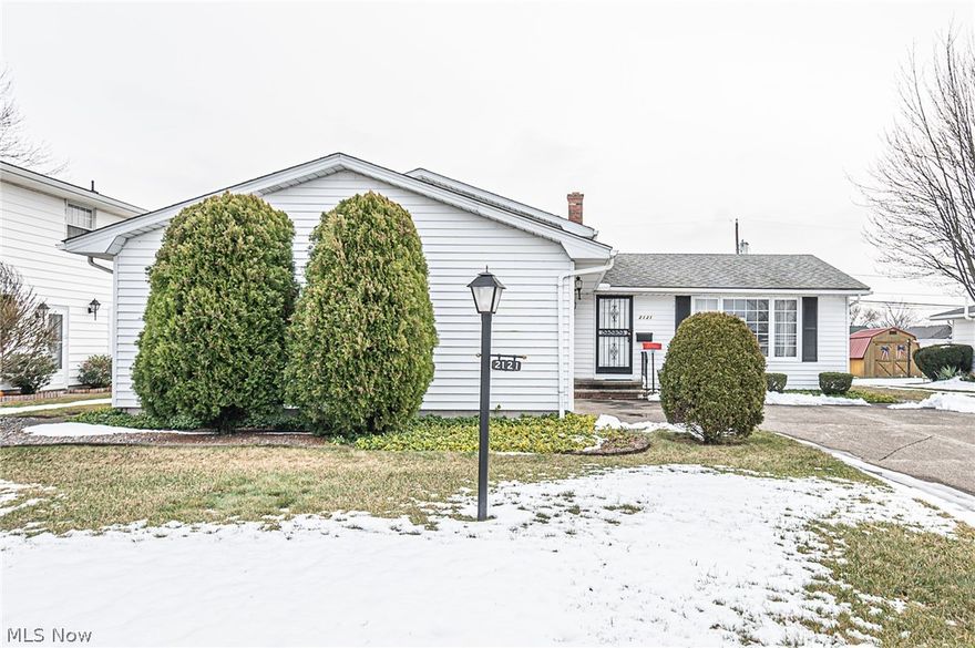 Welcome to this lovely split level home on .25 acres in a quiet neighborhood in Lorain. This home has been well maintained and is meticulous. Enter through the foyer and living room that opens to the large eat-in kitchen with all appliances included. Lower half level features large family room, half bath and mud room to the 2 car garage with attic storage. Upper level features the master bedroom and 2 other large bedrooms and full bath. Exterior has been well maintained and includes a nice shed for storage and a patio out back. Newer boiler system for heat. Setup a showing today!