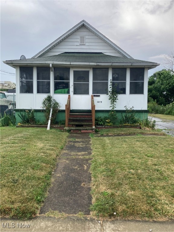 Cozy 2 Bedroom Home with Screened in Front Porch, 1 and a Half Baths, Full Basement, Garage Parking and offers Convenient Store Within Walking Distance, Lake Erie and Grocery Store Within Minutes of Driving. Newer Roof and Windows. Newer Water Tank and Furnace. All New Electric and Plumbing Has All Been Serviced. Don't Miss Out on This Great Opportunity!