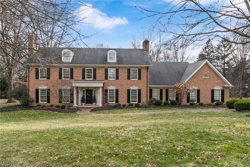 Enjoy the beauty and charm of this 5,198 Sq. ft. brick home and the picturesque 1.63 acre setting, located in the prestigious Hills and Dales Village. Quality and fine craftsmanship are evident throughout. This floor plan is perfect for entertaining family and friends and you will love the extensive updates that have been done to make this home picture perfect and move in ready. Most notable is the fantastic remodeled Kitchen  w/ high end appliances and Master Suite with luxurious His and Her separate Bath Rooms and abundance of closet and storage space. Guest suite with completely new ensuite Bath, New Main Bath and Bath on 1st floor. Relax and unwind in the year round Sunroom overlooking the parklike backyard. There are beautiful hardwood floors throughout this lovely home and over $200,000+ in recent updates. This one is a must see!